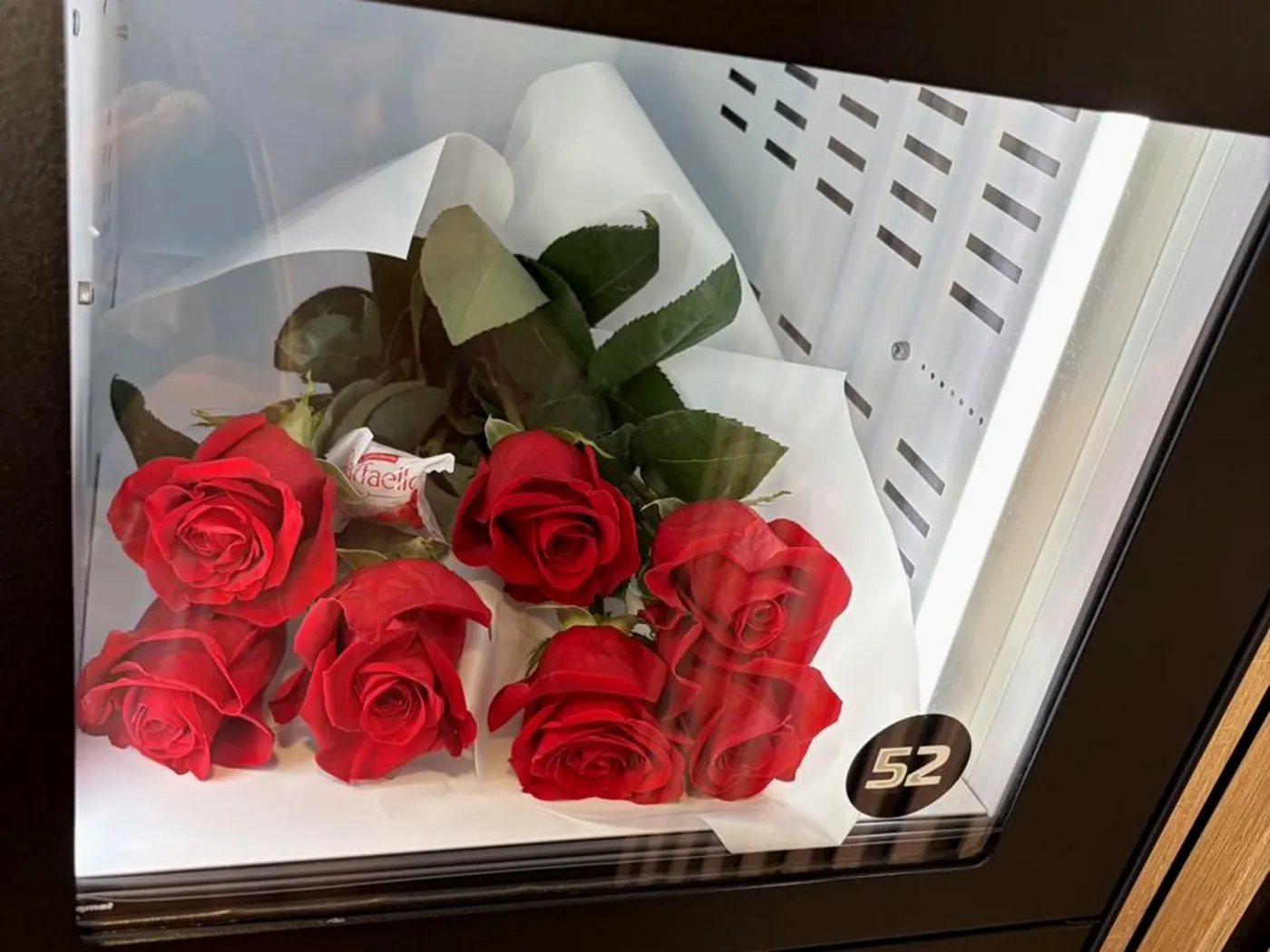 A bouquet in a lit chilled box — what you see is what you get